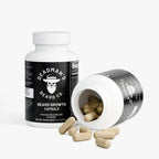 Beard growth capsules in white bottles with black labels, promoting natural beard growth and vitality.